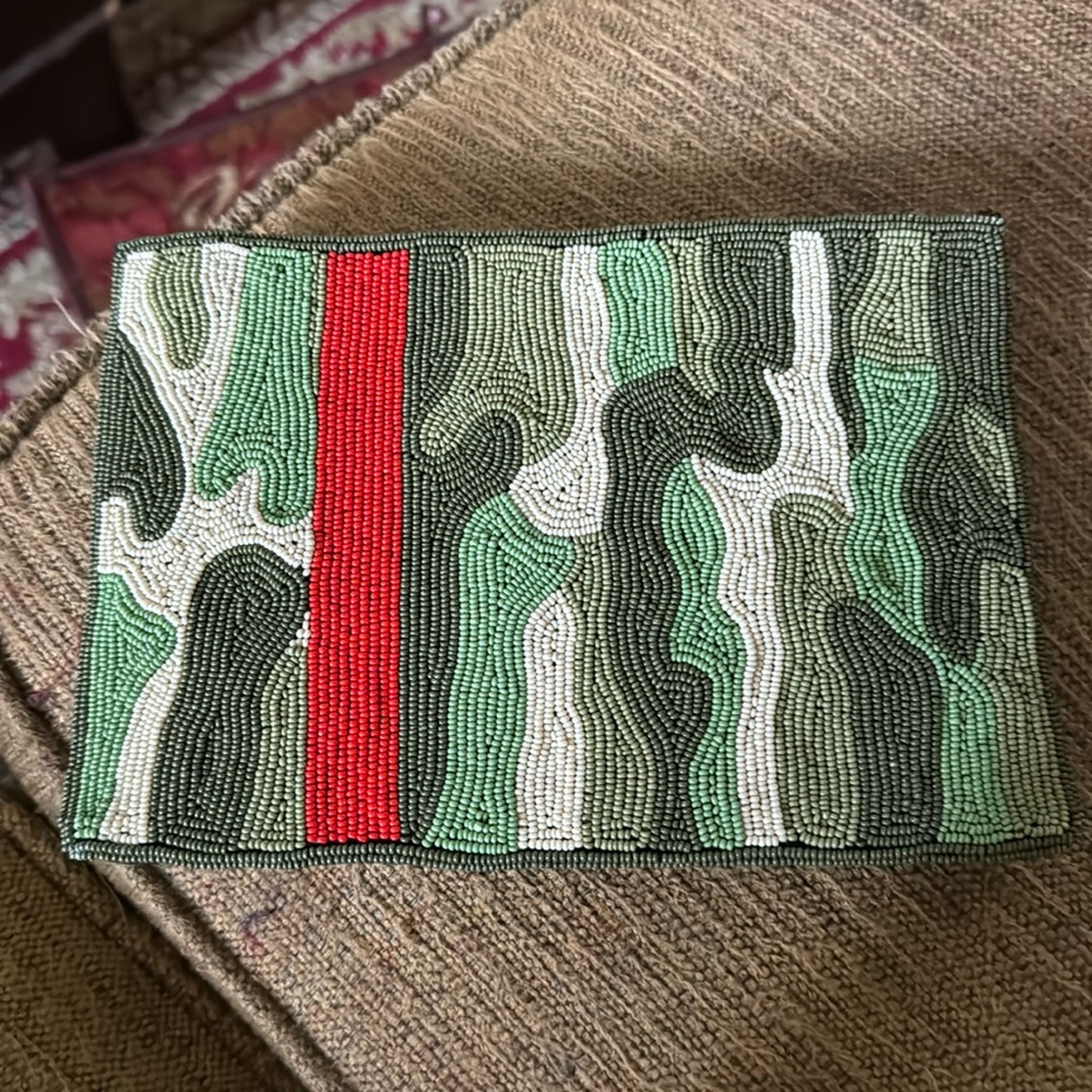Camo makeup pouch by Ink and Alloy.